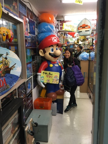 My wife posing with Mario